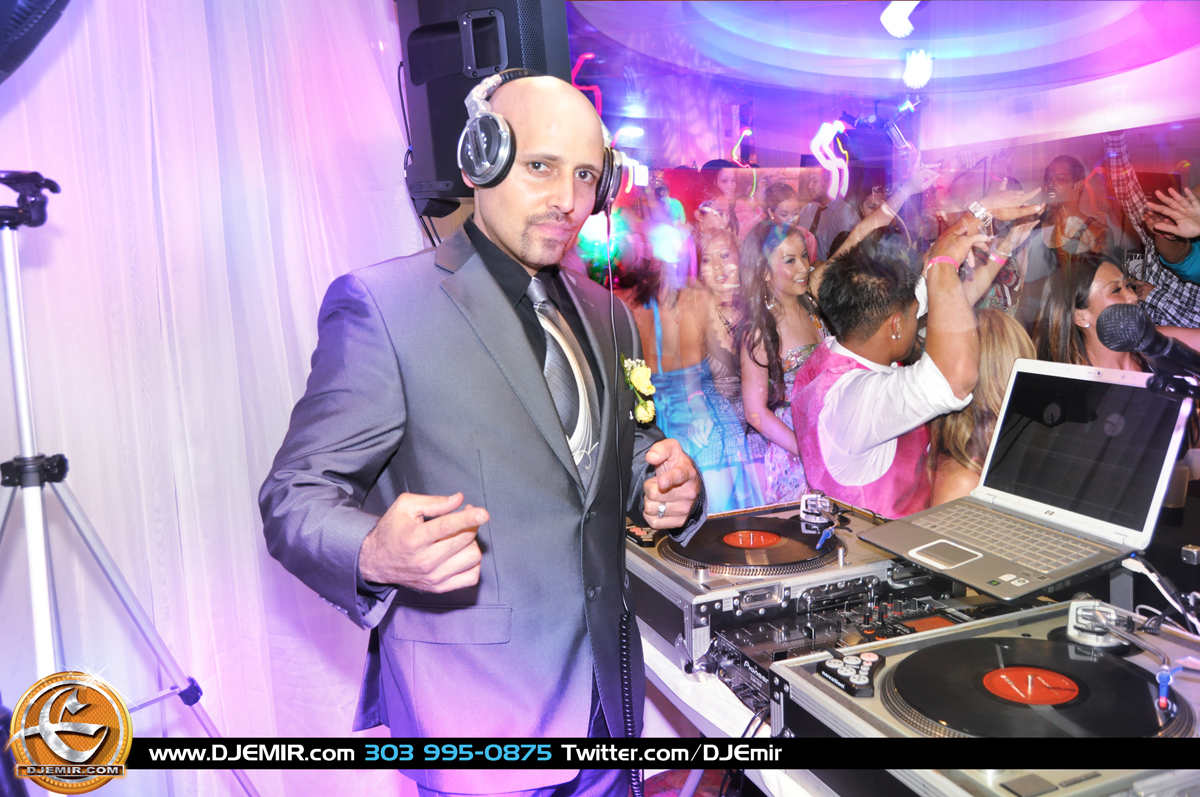 DJ Emir Santana of DJEMIR.com and Denver's Best DJs head DJ headliner behind the Turntables at a Vietnamese wedding